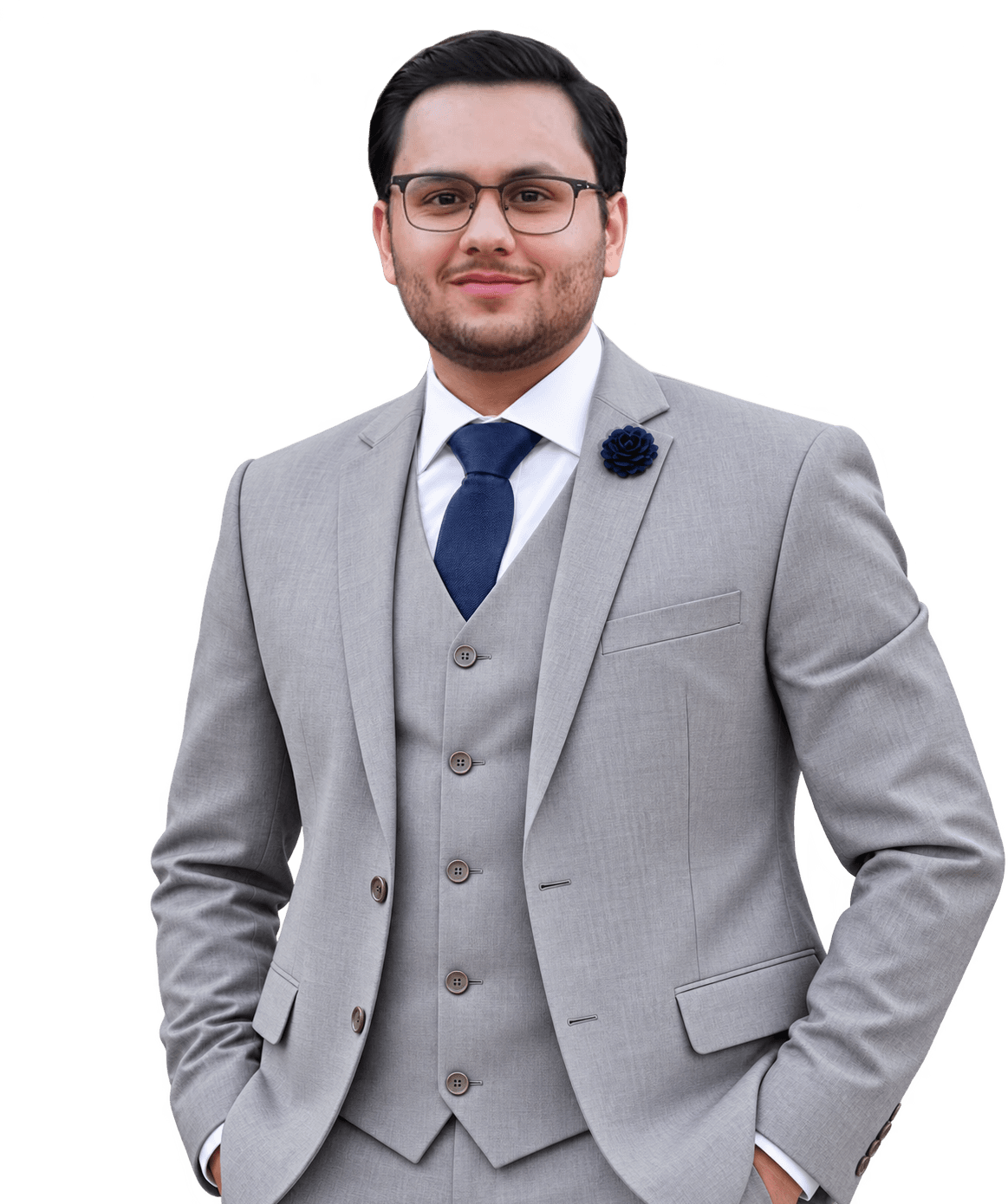 Arham Irfan standing in a grey three-piece suit